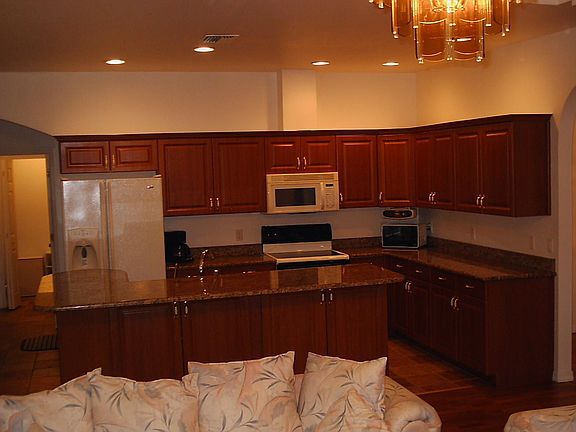Large kitchen, wood cabinets & granite