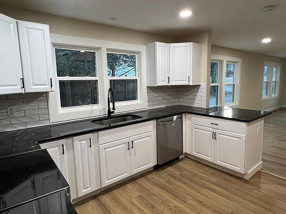 All new kitchen with granite and stainless appliances
