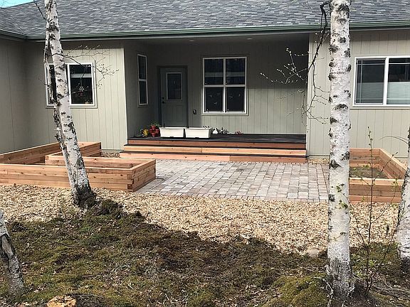 Raised garden beds in back