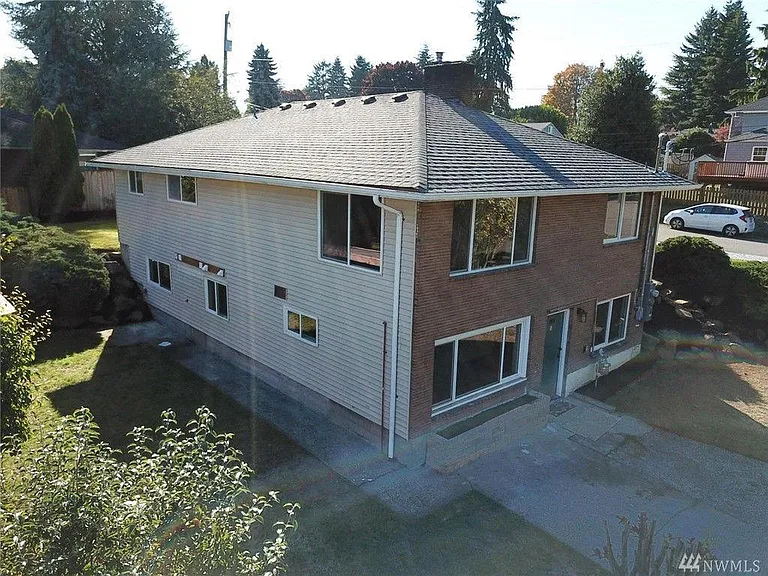 Full view of the house. Lower unit is for rent; Upper unit is owner occupied. Separate entrance for each unit.