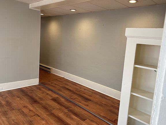 Living room with built-in bookcase.