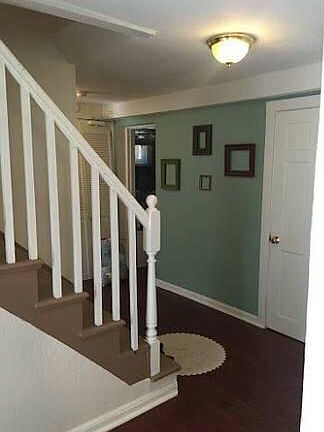 Stairs from main foyer into Apartment G