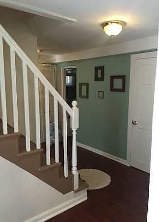 Stairs from main foyer into Apartment G
