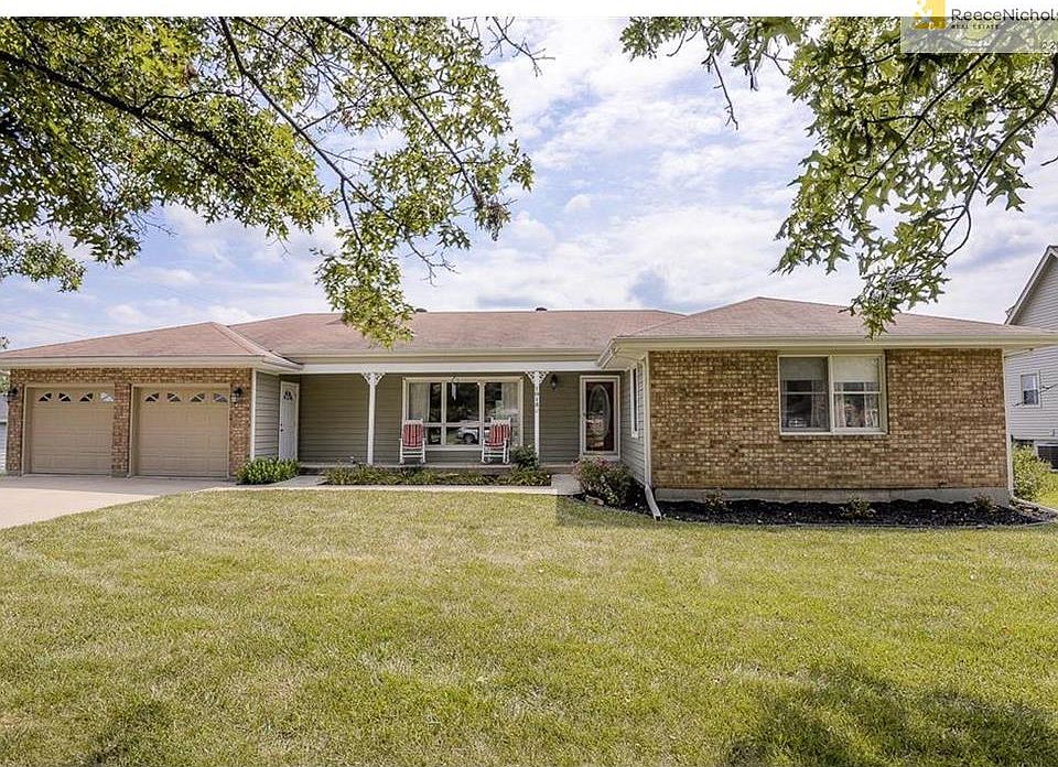 Country Club Heights ranch home with cozy covered porch.