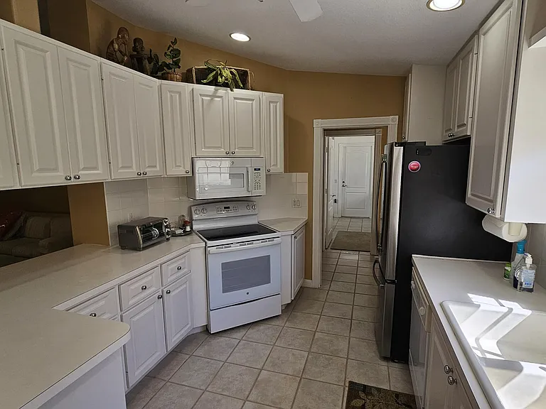 7960 SE Peppercorn Ct — Photo 7