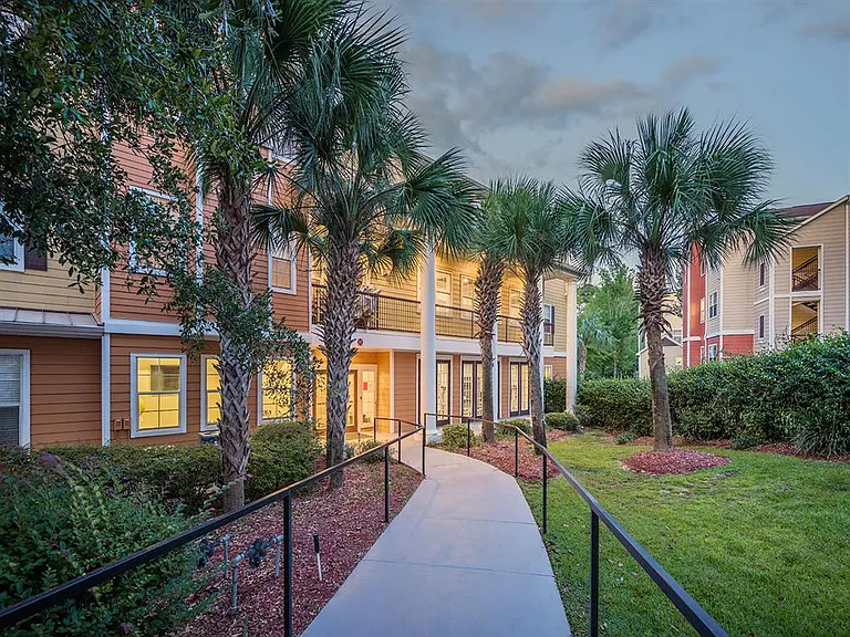 Walkway to Evergreens at Mahan apartment building