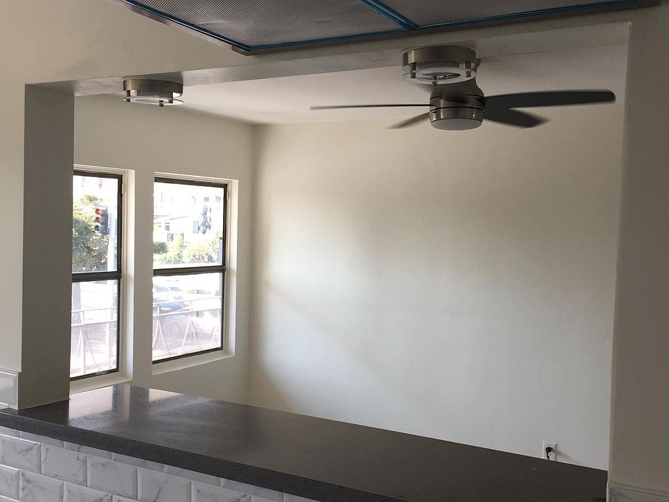 Kitchen looking into living room