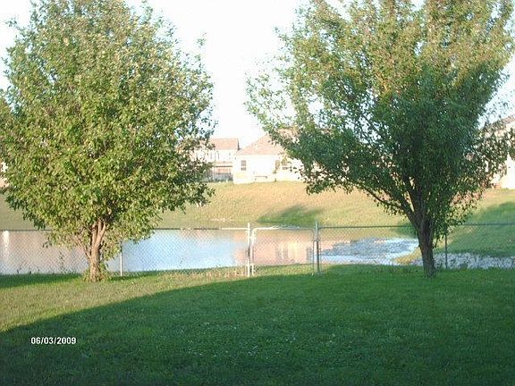 Fenced backyard on lake