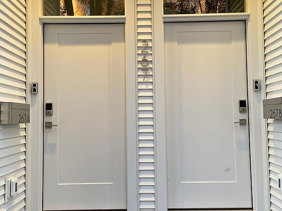 Well lit front doors with digital lock and Ring doorbell and alarm system