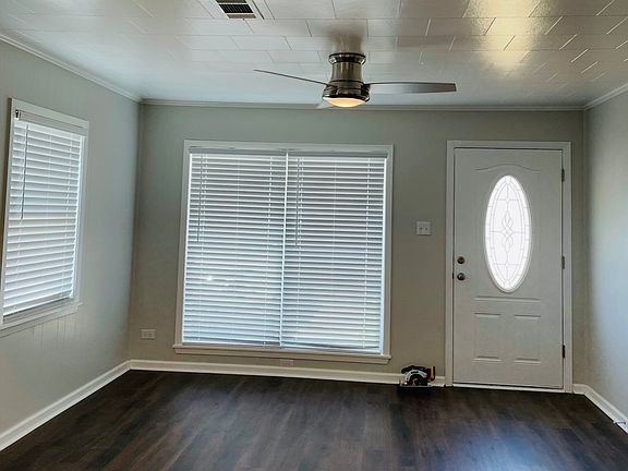 Living room with wooden blinds