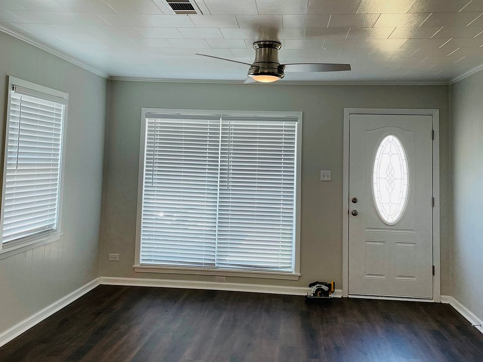 Living room with wooden blinds