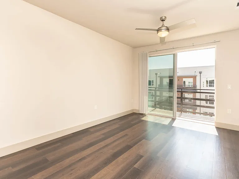 Living Room with Balcony and Hard Surface Flooring