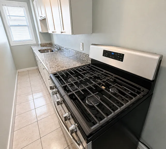 766 Plymouth Ave Fall River MA Spacious 3BR, 1BA w/ Large Master & Off Street Parking — Photo 1