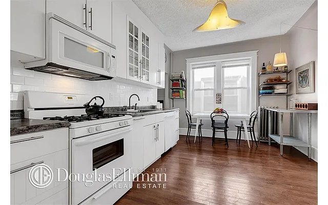 Sold by Douglas Elliman | media 12