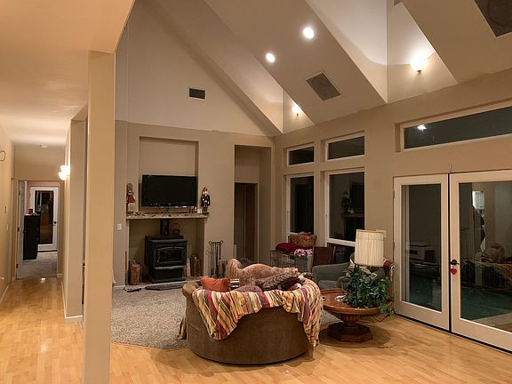 Living room with vaulted ceiling