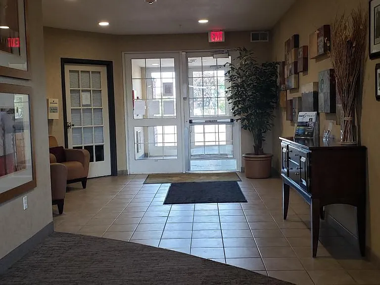 Welcoming entryway with conveniently located management office in a secured building