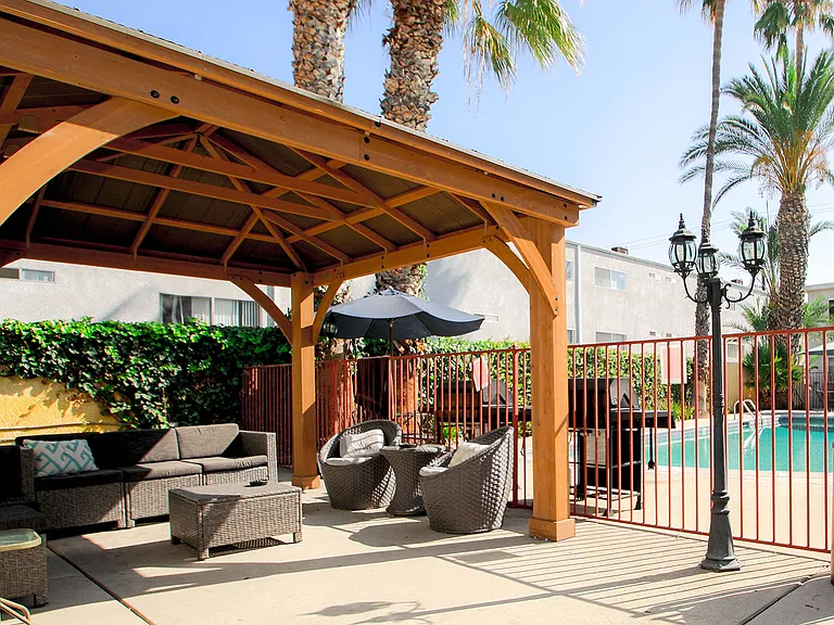 Gazebo and seating area by the pool.