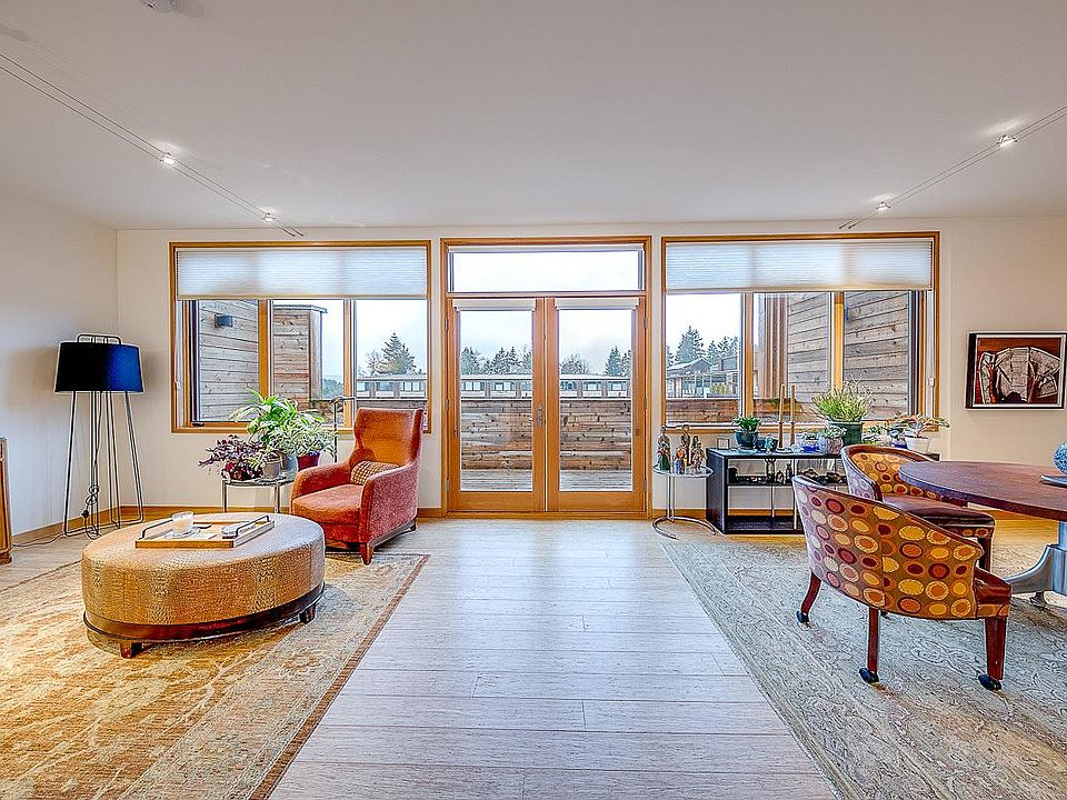 View from kitchen to 144 sq ft deck for indoor/outdoor living