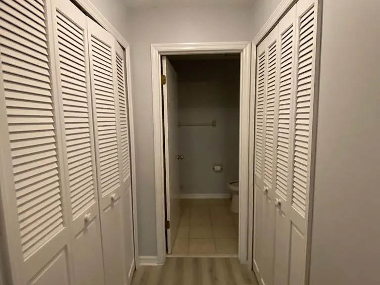 Master closets to private bathroom with shower