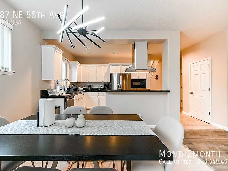 487 NE 58th Ave — Photo 9
