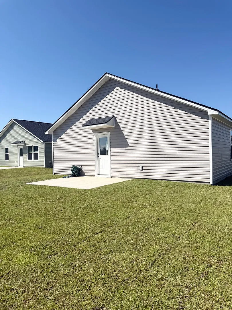 Brand-New 3-Bedroom Rental Home with Pond View — Photo 3