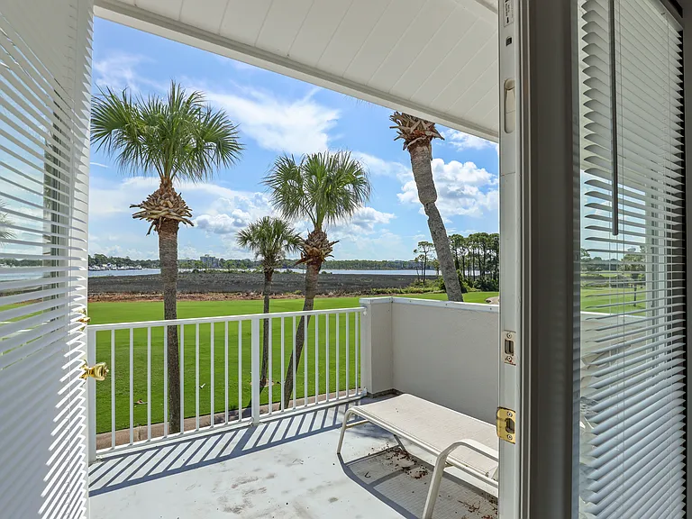 Master Bedroom Balcony Overlooking Golf Course and Bay