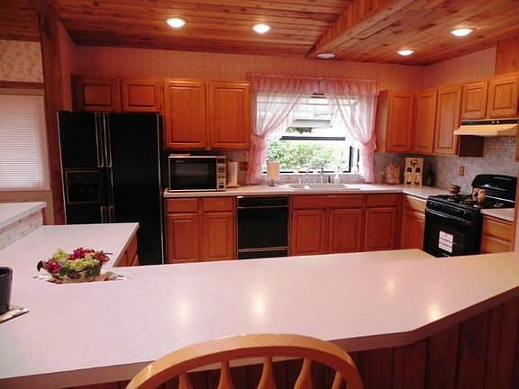 Spacious, open kitchen has lots of storage and room for more than one cook!