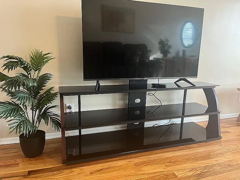 Large TV in living room. Cable and internet are included in the rent.