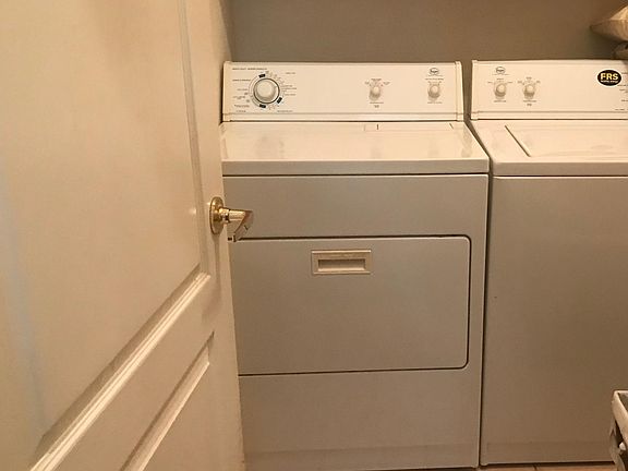 Nice size laundry room. Has a door that leads to garage.