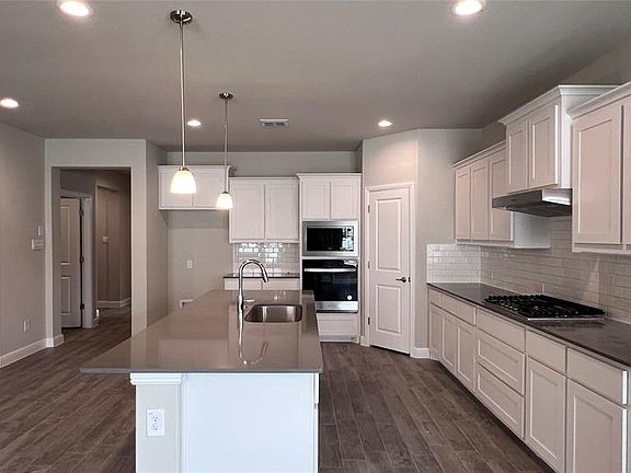Kitchen - All Home and community information, including pricing, included features, terms, availability and amenities, are subject to change at any time without notice or obligation. All Drawings, pictures, photographs, video, square footages, floor plans, elevations, features, colors and sizes are approximate for illustration purposes only and will vary from the homes as built.