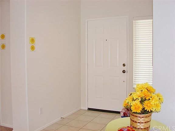 TILED ENTRY, 6 PANEL DOORS THROUGHOUT HOME, DRAMATIC VOLUME CEILINGS GIVE THIS HOME an ERA of OPEN CONCEPT LIVING. NO CLOSED IN APT. FEELING HERE. FRESHLY PAINTED INTERIORS, ALL NEW CARPETING. NON-SMOKING HOME ORIGINAL OWNERS.