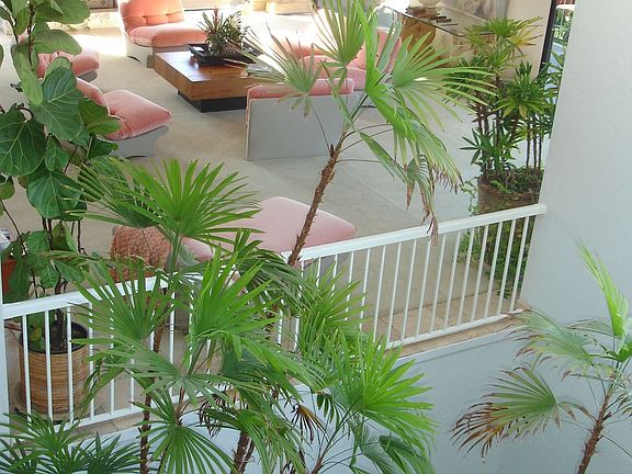 Impressive atrium & fountain in the center of the home.