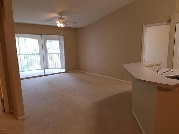 living area & screened balcony