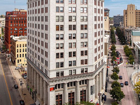 McKay Tower 
In the center of it all! The location provides easy transportation to many retail and event options. Most within walking distance.
