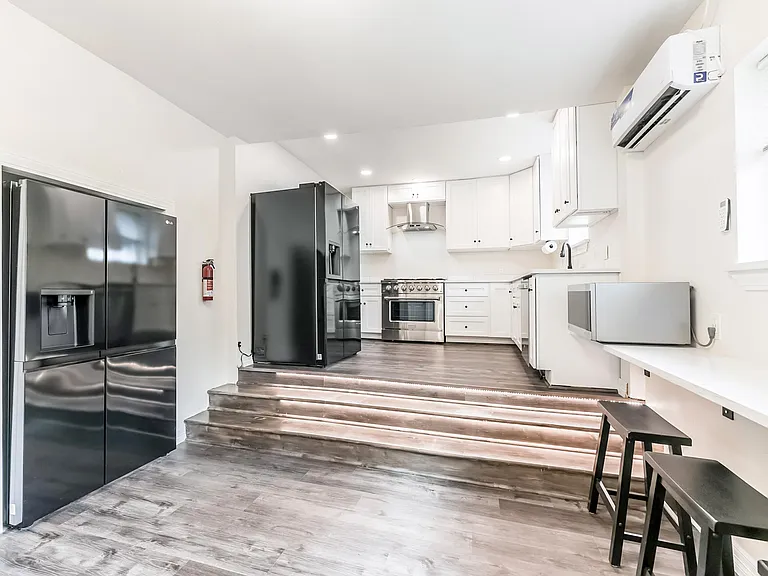 Large updated kitchen with dual fridge
