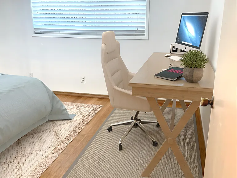 Ample sized Downstairs bedroom.(virtually staged)