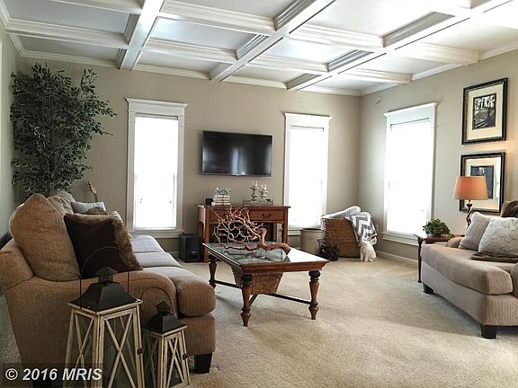 Generous Sized Family Room w/ Coffered Ceiling