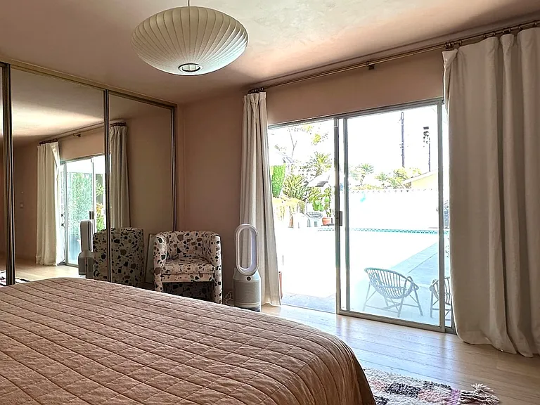 view of pool from master suite