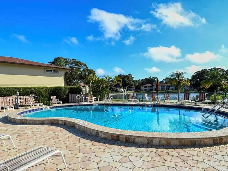 COMMUNITY POOL COMPLIMENTED WITH HEATERS AS WELL COOLERS FOR TRUE YEAR ROUND COMFORT