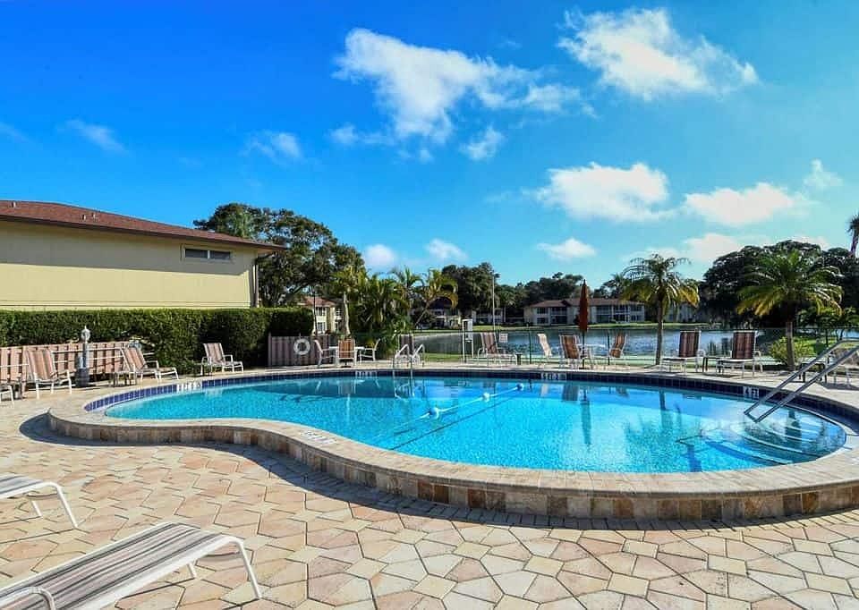COMMUNITY POOL COMPLIMENTED WITH HEATERS AS WELL COOLERS FOR TRUE YEAR ROUND COMFORT
