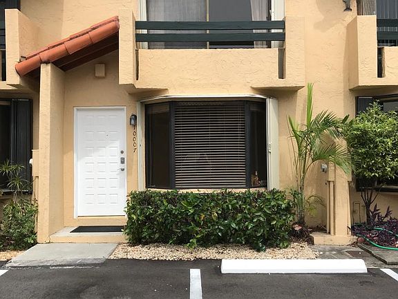 Entry to home, 2 parking spaces assigned at doorstep