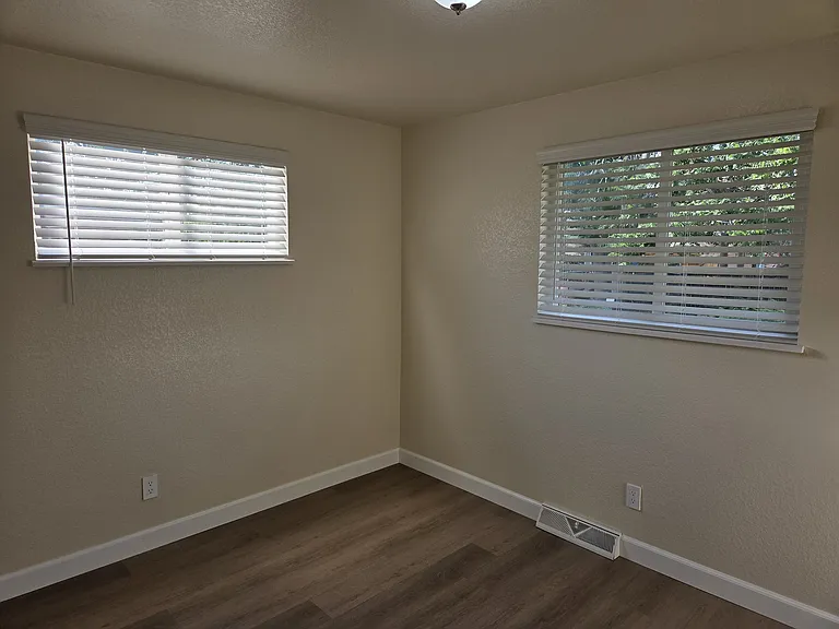 Bedroom 3 with sliding door closet.