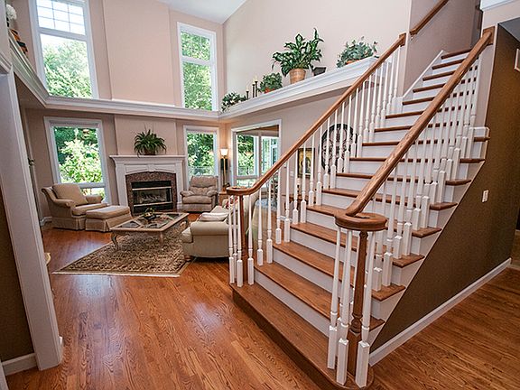 The beautiful staircase adds a special touch of elegance to the entire main floor.