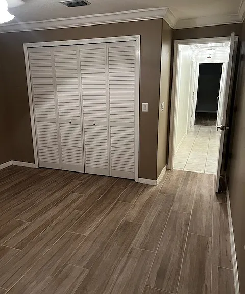 Large Closet bin bedroom #2 with (louver doors)