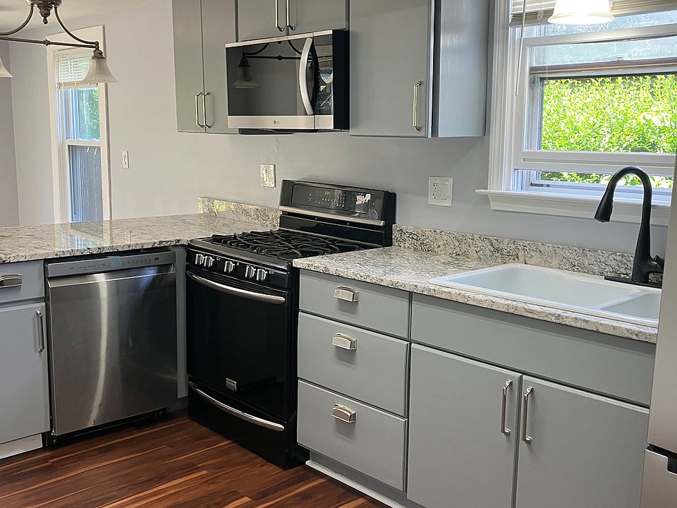 Newly renovated kitchen with granite and stainless steel appliances.