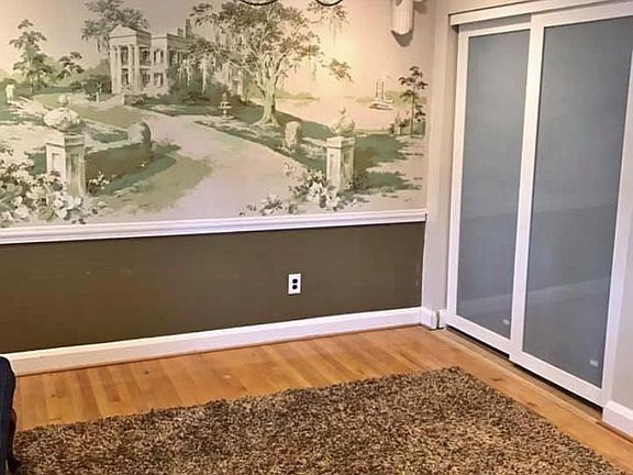 Renovated family area with hard wood floors