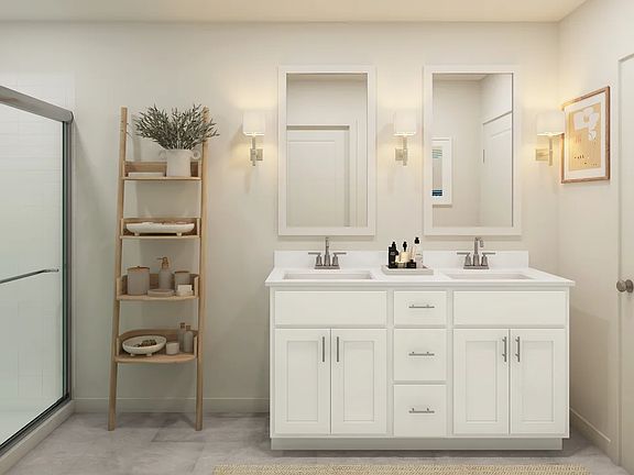 Primary bath with dual sinks and chrome fixtures