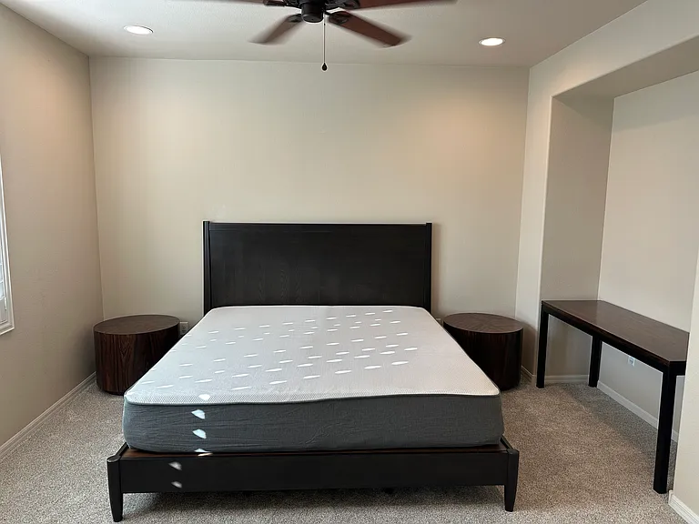 Primary bedroom with King Mattress and modern decor