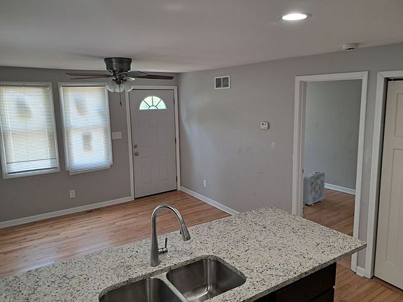 Living Room from Kitchen Breakfast Bar and front 12x8.5 Bedroom