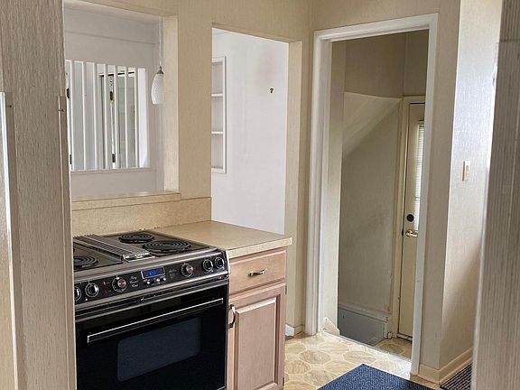 Kitchen /Side Entrance to Kitchen - Basement